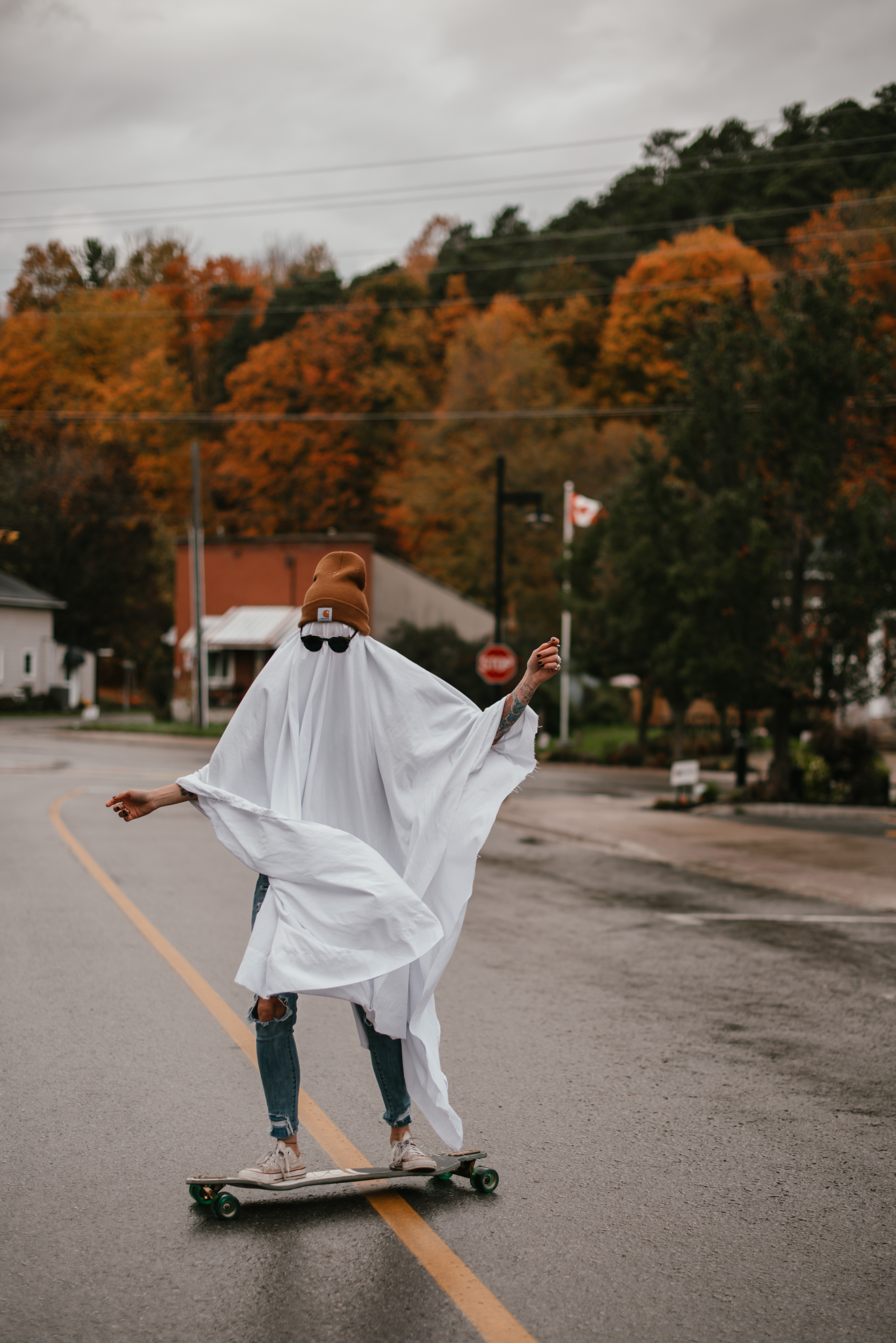Meagan McLean dressed as a ghost on a skateboard in Warkworth